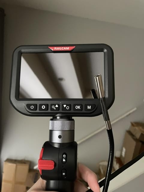 Ralcam F606B held in hand, 5-inch screen and threaded probe connector - customer photo